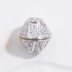 Macro shot of S925 silver rhombus pendant connector with sparkling zircon stones