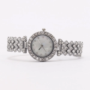 Silver fashion watch for women featuring a shimmering mother-of-pearl dial and crystal bezel