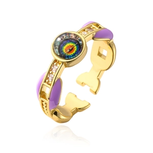 Detail of 18K gold plated open ring with purple enamel and sparkling zircon accents