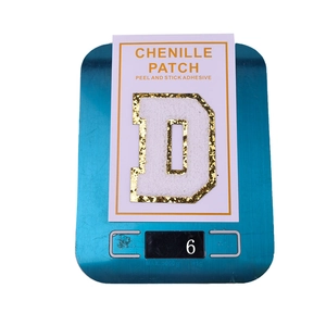 8cm letter D chenille patch with gold glitter edge weighing 6g on digital scale