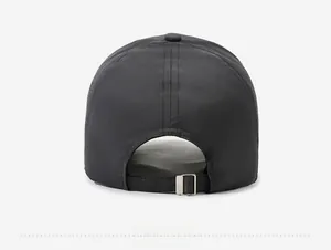 Detail view of the breathable ripstop fabric and metal adjustable buckle on the back of cap