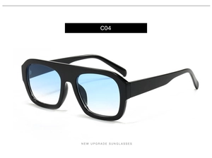 Macro detail of square flat top sunglasses showing blue gradient lenses and C04 model logo