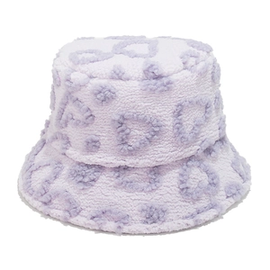 Detail of lavender faux shearling bucket hat featuring purple heart leopard print pattern