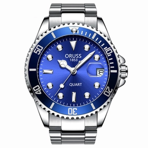 Detail view of quartz watch with blue dial, silver steel strap and calendar window