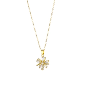 French style gold flower pendant necklace with clear zircons on a white background