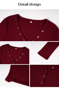 Detailed close-up of burgundy ribbed knit long sleeve top with metal snap buttons and V-neck
