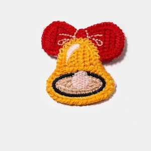 Pince à cheveux cloche de Noël crochetée à la main avec un gros nœud rouge élégant