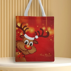Detail of Christmas canvas tote bag featuring a cute reindeer print and holiday greetings