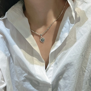 Elegant S925 sterling silver heart necklace with Best Wishes engraving on white shirt