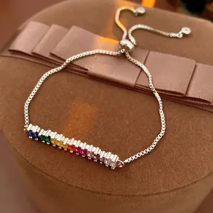 Adjustable sterling silver bracelet with rainbow rectangular cubic zirconia in a gift box