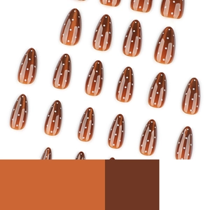 Faux ongles amande œil de chat marron avec pois blancs sur fond blanc minimaliste