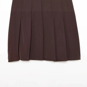 Fashionable pleated brown skirt with belt design showing detailed fabric texture