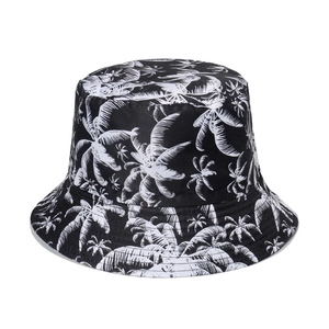 Unisex bucket hat featuring palm tree print for beach and outdoor sun protection