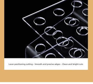 Detail view of transparent acrylic pen holder with laser-cut smooth circular holes