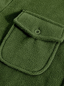 Detail of forest green fleece jacket featuring tactical chest pocket and button closure