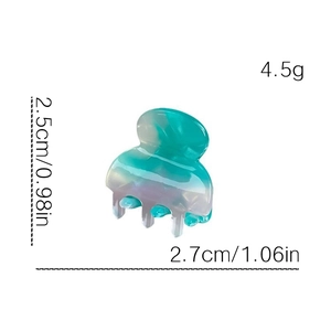 Mini acetate hair claw clip with green marble texture and size measurement markings