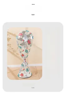 Detail of waterproof electric fan cover with cute dinosaur and watermelon print patterns