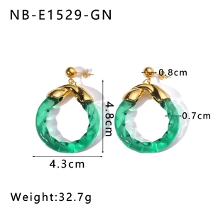 Detailed view of green resin hoop earrings with gold metal base and dimensions