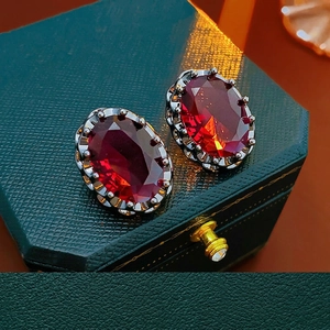 Vintage oval zircon earrings with red gemstones and silver needles in royal palace style