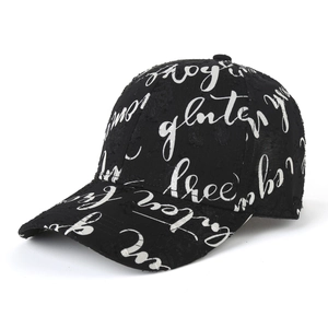 Unisex black baseball cap with trendy white graffiti script and textured mesh design