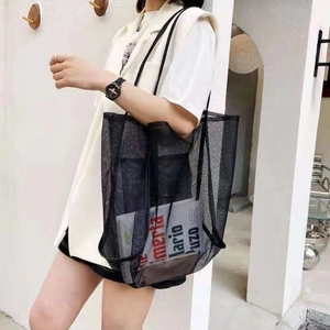Black mesh tote bag for women showing large capacity and stylish transparent nylon material