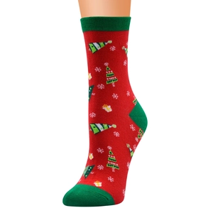 Detail of red Christmas socks with green heel and toe featuring festive tree patterns