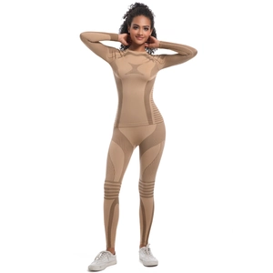 Detail view of khaki seamless knit yoga set showing breathable texture and slim fit design