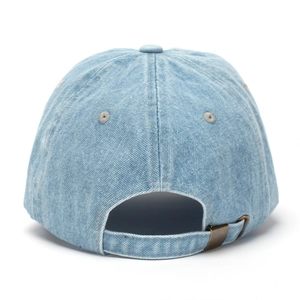 Detail of light blue washed denim cap with bronze buckle and embroidered eyelets