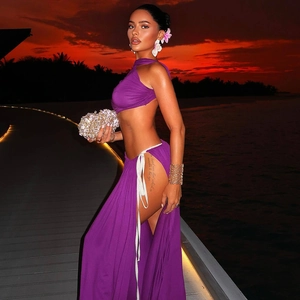 Detail view of purple two-piece set featuring a side-tie high slit maxi skirt for women
