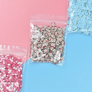 DIY polymer clay cane slices with Christmas santa, bow and snowflake for nail art crafts