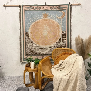 Detail of woven Bohemian tapestry with fringe and XVII The Star Tarot card pattern