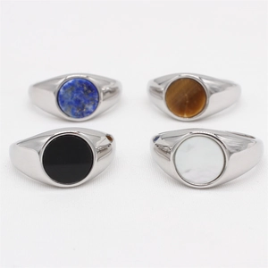 Minimalist silver signet rings featuring lapis lazuli, tiger eye, and onyx stones