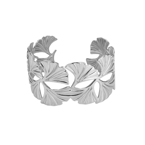 Detail of silver-plated open cuff bracelet with intricate ginkgo leaf cutout design