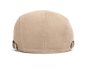 Rear view of mesh beret hat with adjustable metal buckles for breathable summer comfort