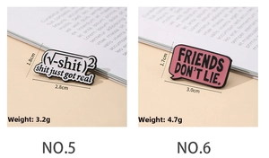 Detail of creative enamel pins with NO.5 math formula and FRIENDS DON'T LIE text designs
