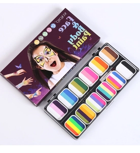 Detailed view of the 12-color water-based face and body paint palette with brushes