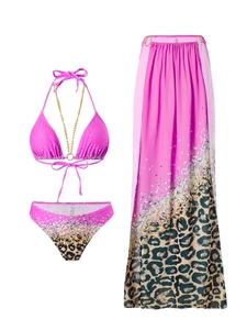 Detail of pink leopard print three-piece bikini set with gold chain and sheer mesh long skirt