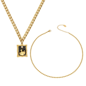 Vintage gold necklace with rectangular relief pendant and pearl on chunky link chain