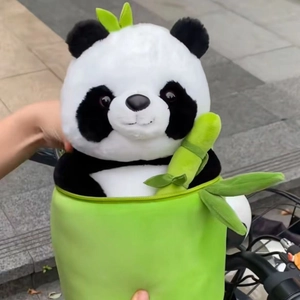 Cute panda plush toy in a green bamboo tube container for festival gift