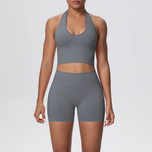 Detail of dark gray seamless ribbed yoga set with halter v-neck top and high waist shorts