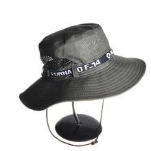 Detail of vintage washed baseball cap with wide brim and side breathable mesh panel