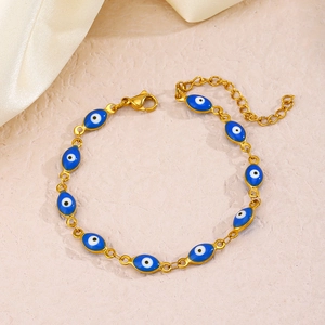 Bracelet vintage français en acier inoxydable avec charmes œil porte-bonheur bleu émail