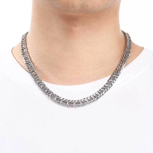 Polished silver curb chain necklace for men and women shown on a model with a white t-shirt