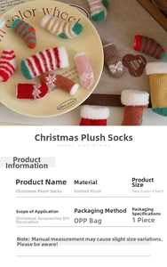 Detailed view of mini knitted Christmas socks and plush hats for DIY holiday crafts