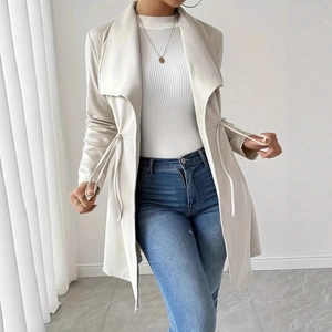 Detail of cream drawstring waist cardigan with lapel collar and adjustable ties