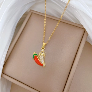Luxurious gold-plated chili pendant necklace with red enamel and sparkling crystal pavé
