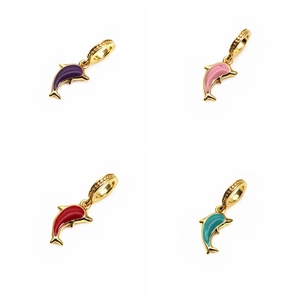 Detailed view of four colorful enamel dolphin pendants with gold plating for DIY jewelry