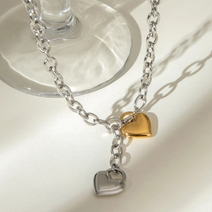 Minimalist stainless steel O-chain necklace with gold and silver heart lock pendants