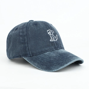 Close-up of navy blue washed cotton baseball cap featuring detailed cartoon dog embroidery