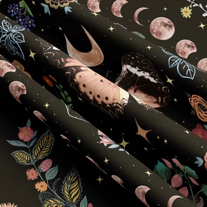 Close-up of butterfly tapestry showing intricate moon phases and vintage floral texture